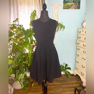 Black cocktail a-line dress pleaded with pockets classy formal classic